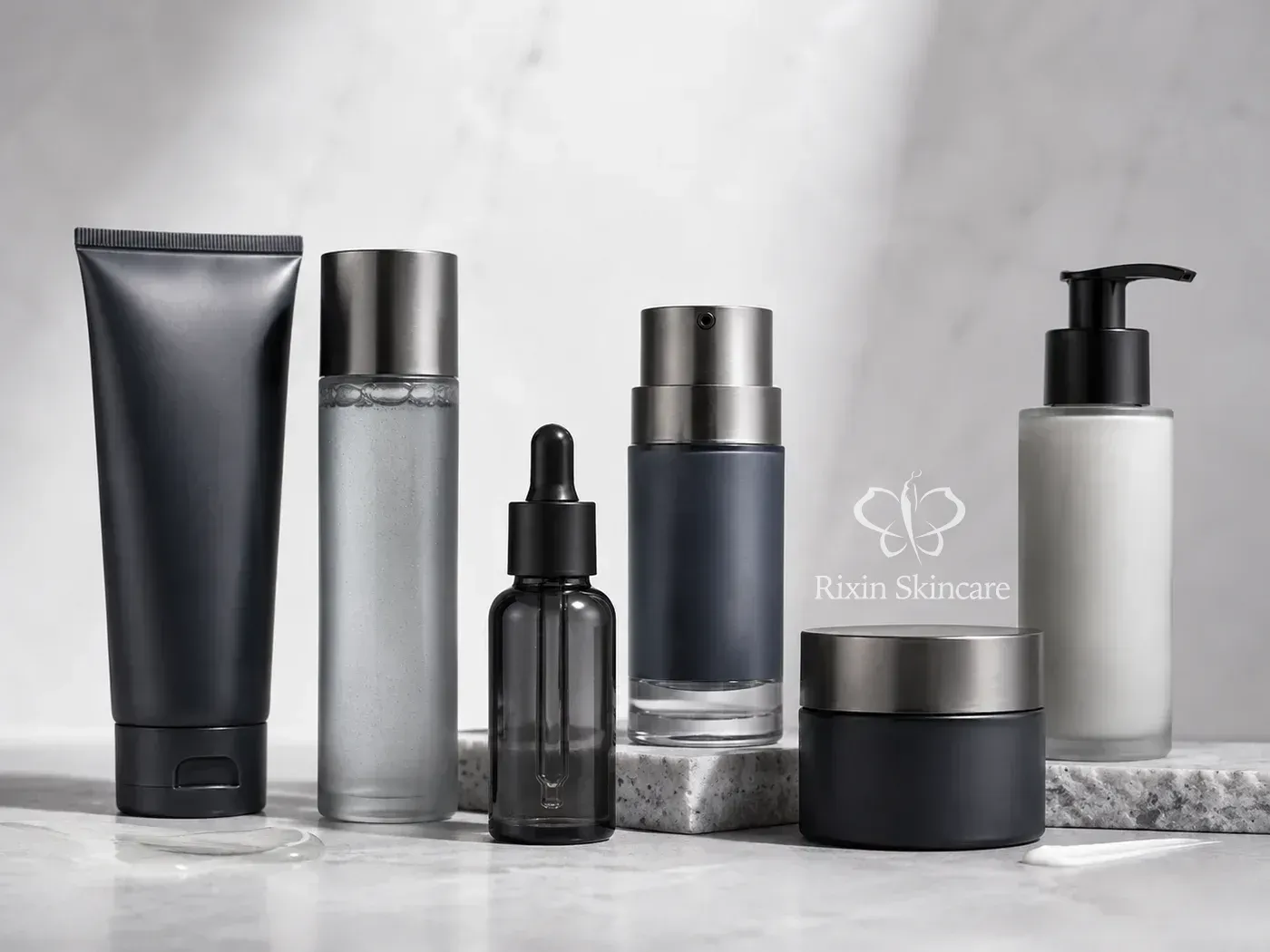 Coordinated men's skincare collection with cleanser, serum, moisturizer, and shaving-care packaging