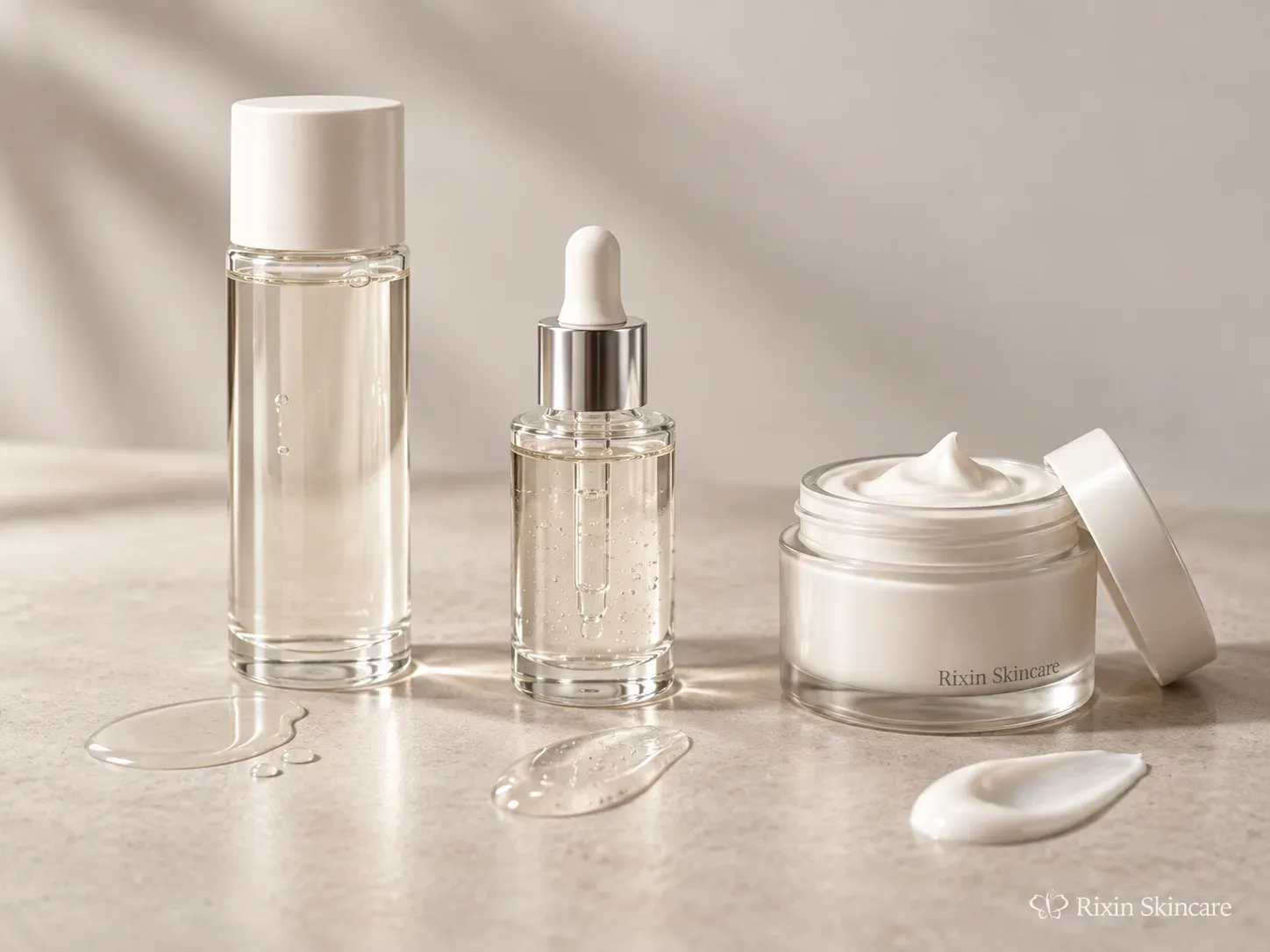 Toner or essence, serum, and moisturizer prototypes arranged as a three-step hydration layering system.