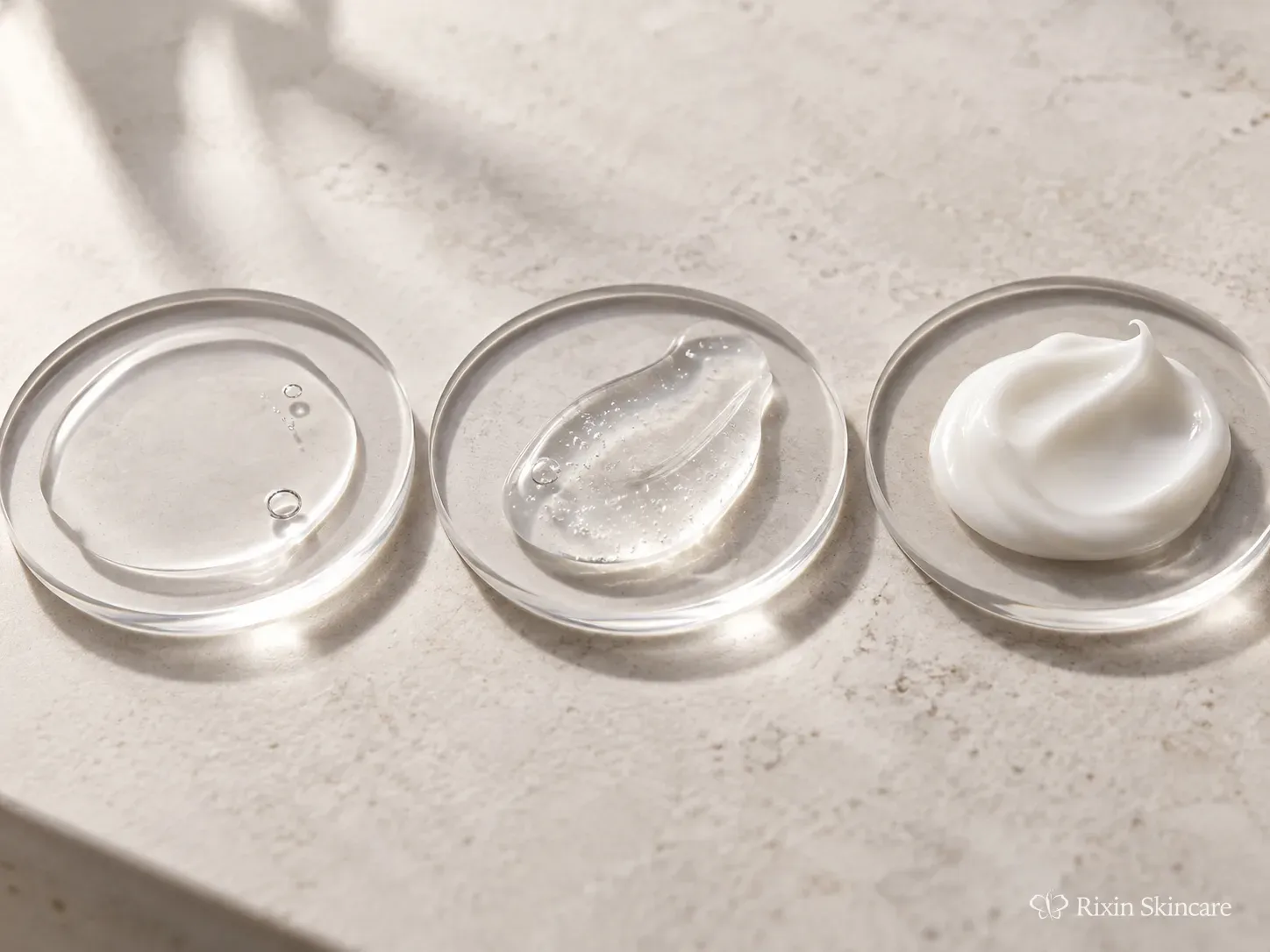 Three skincare texture samples progressing from watery fluid to gel-like serum and richer cream.
