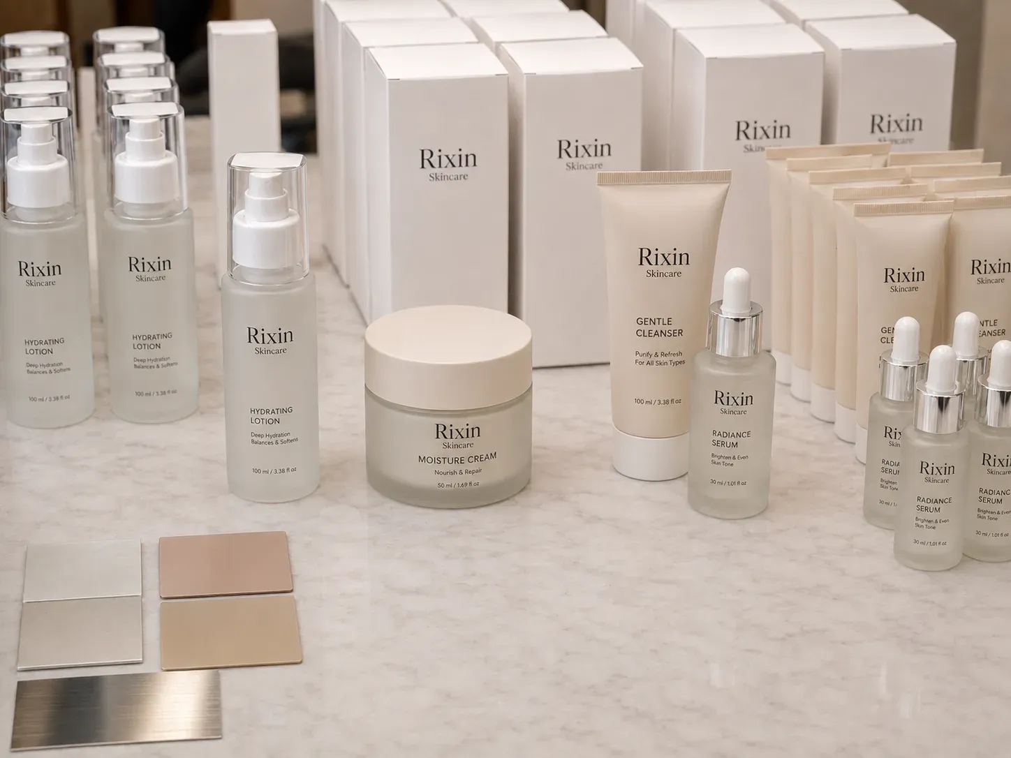 Several skincare SKUs, matching components, and blank cartons arranged for MOQ and production planning